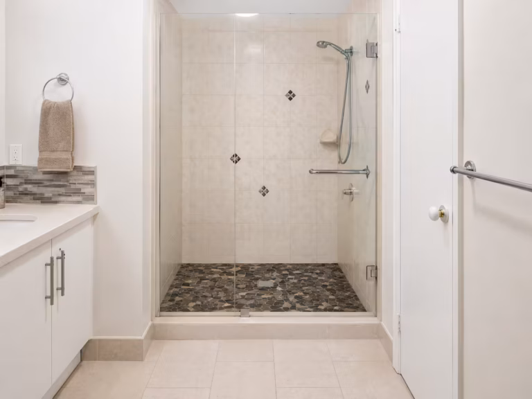 How epoxy shower sealing works — before and after tiles